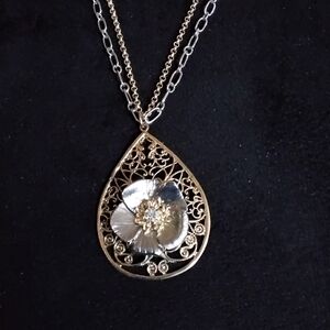 Charming Charlie Gold and Silver toned Floral Pendant Necklace